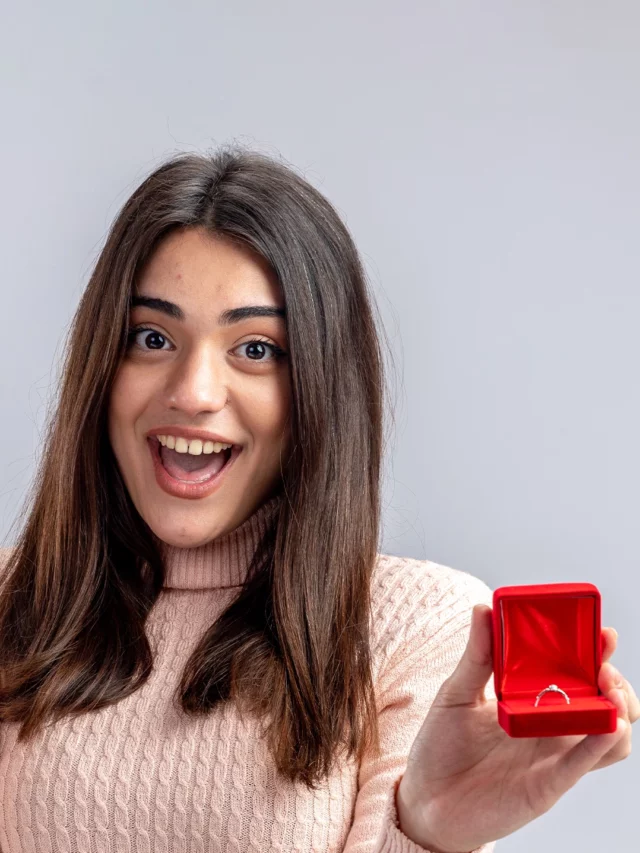 girl looking at a ring